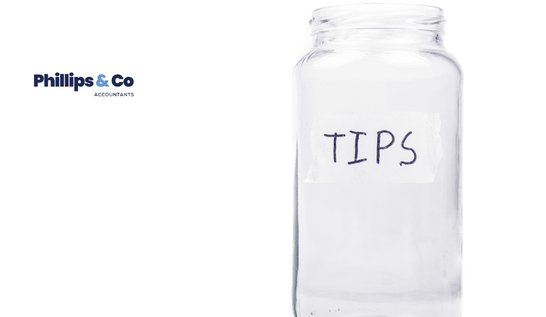 An empty jar with the word 'tips' written on it.